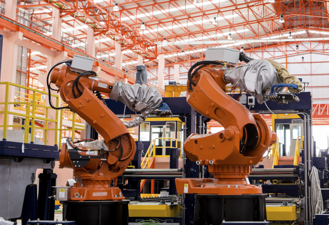 Robots welding in a production line find iso certificate